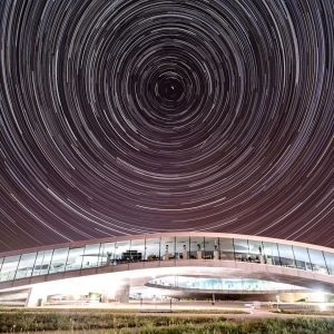 Sky timelapse over Rolex Learning Center